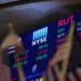 Wall Street hovers near correction phase as tariff risks mount